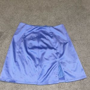 Blue “Lucy in the Sky” mini skirt.